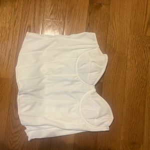 Two large white tops. Corset look. First fashion nova, second shein